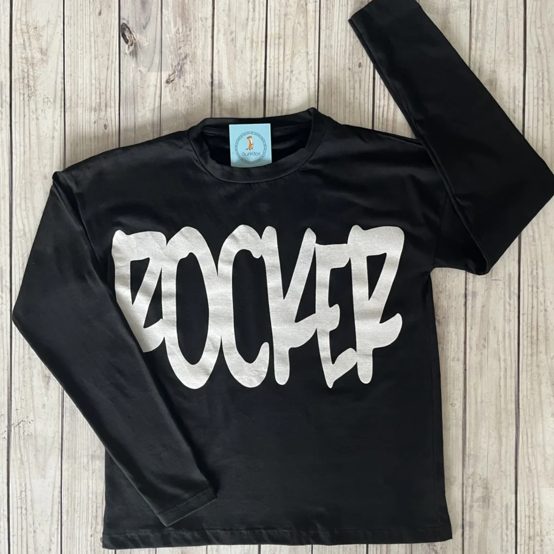 REMERA ROCKER OVERSIZE