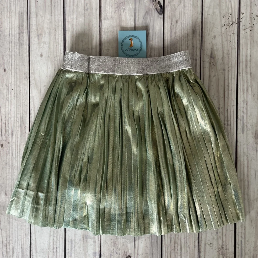 POLLERA METALIZADA VERDE . LINEA IMPORTADA