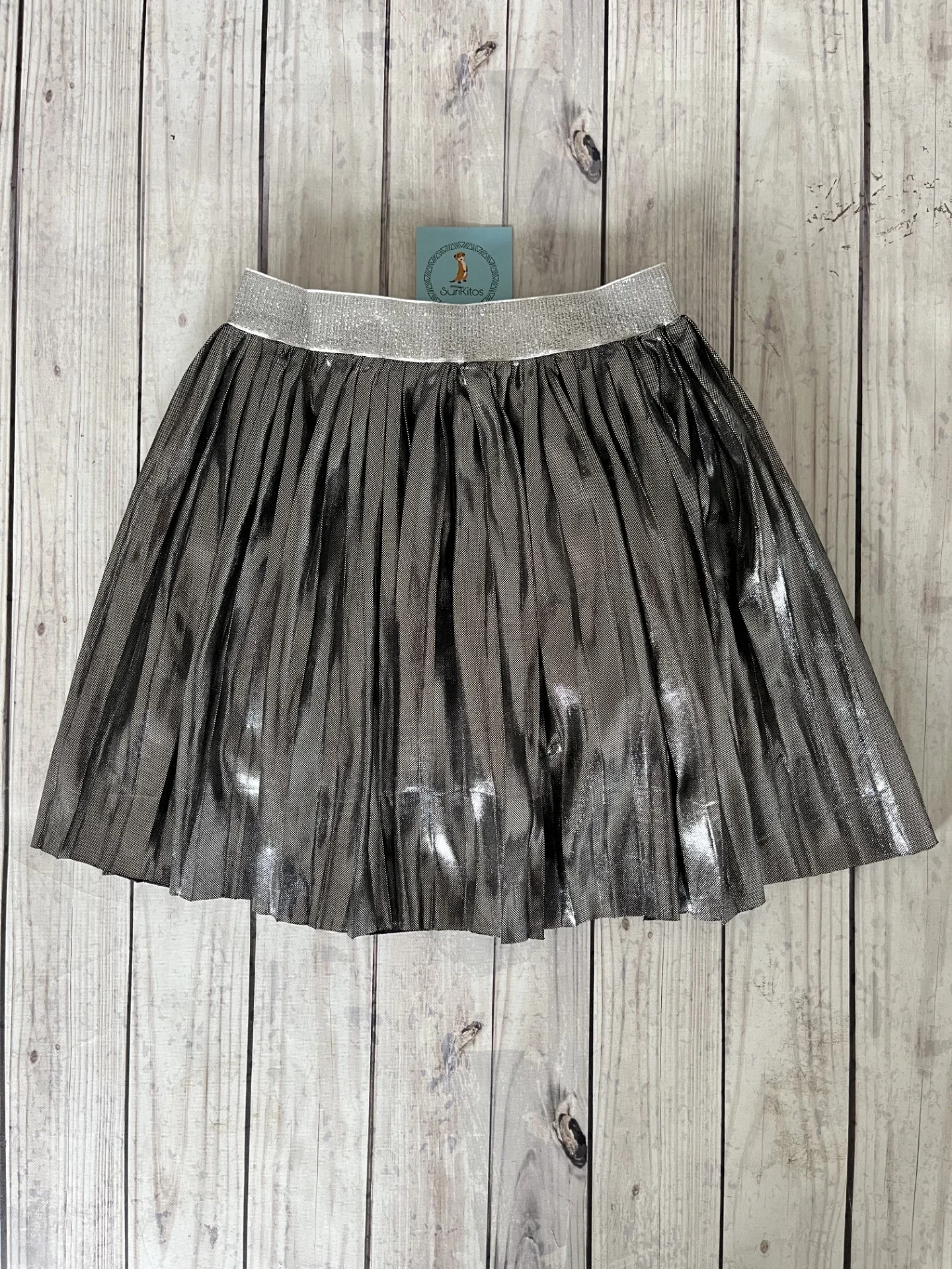 POLLERA METALIZADA NEGRA. LINEA IMPORTADA