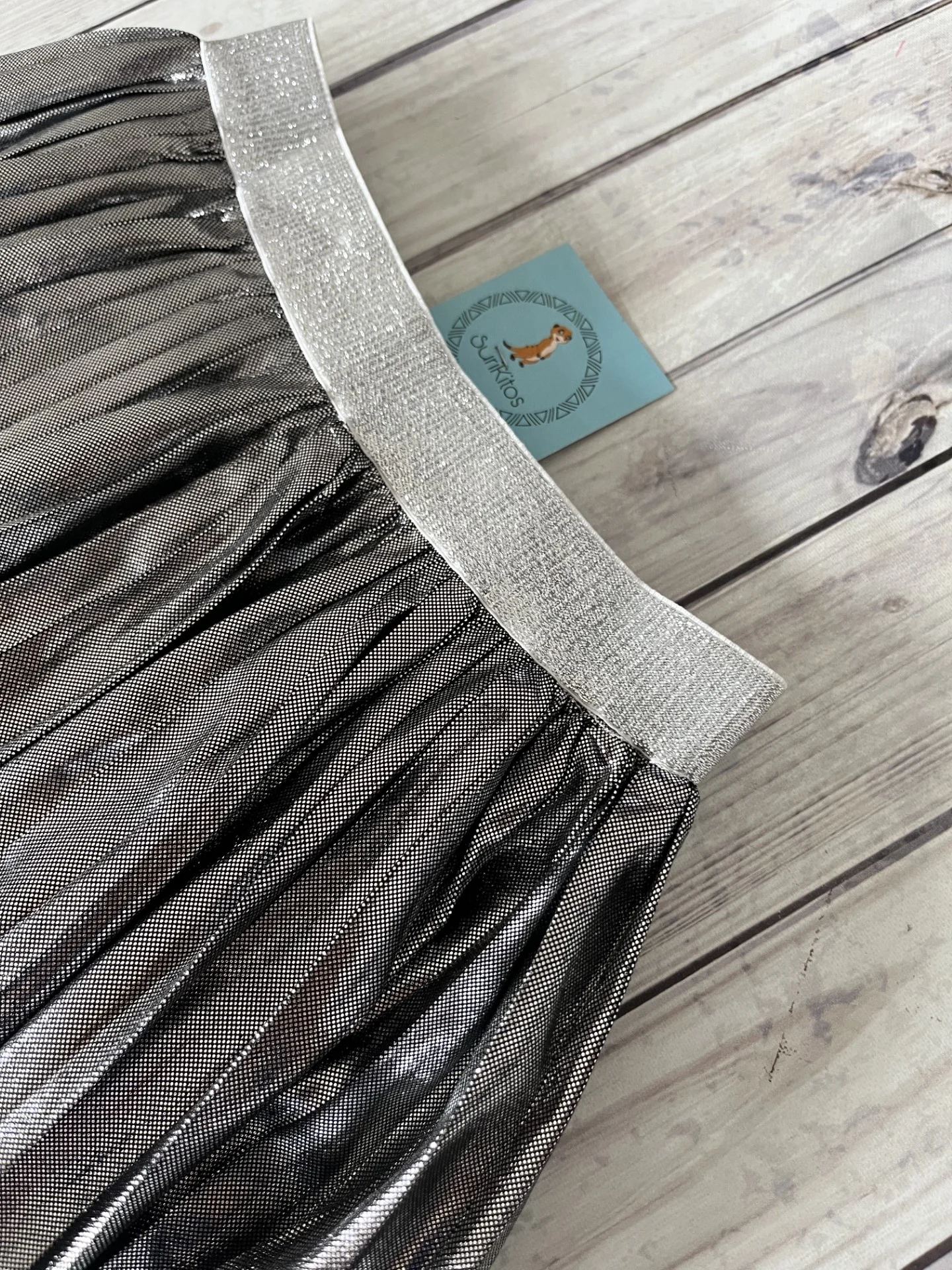 POLLERA METALIZADA NEGRA. LINEA IMPORTADA - Imagen 2