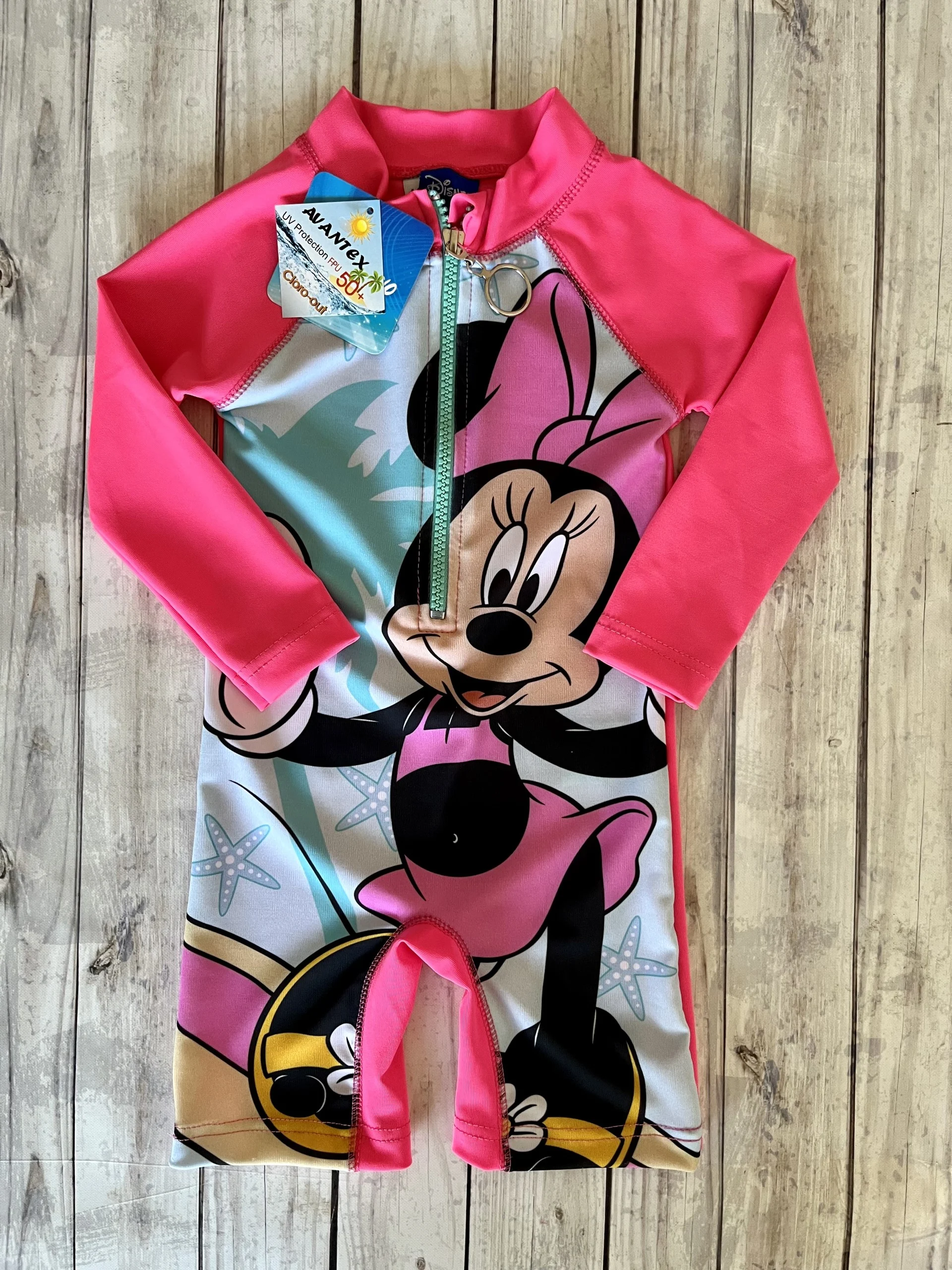 ENTERO MINNIE PSUV+50 FUCSIA NEON. LICENCIA DISNEY