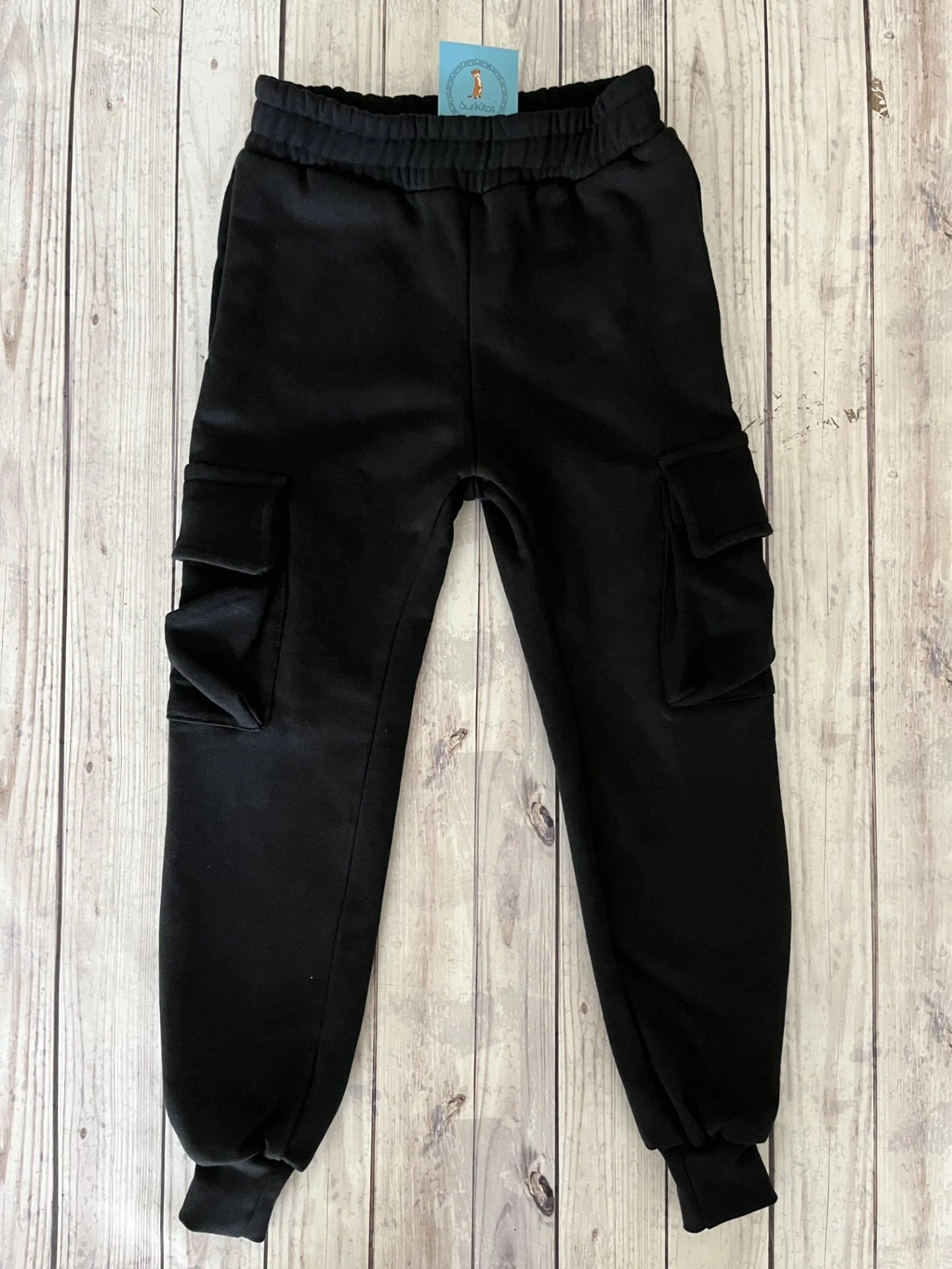 JOGGER CHUPIN  CARGO FRISADO . NEGRO