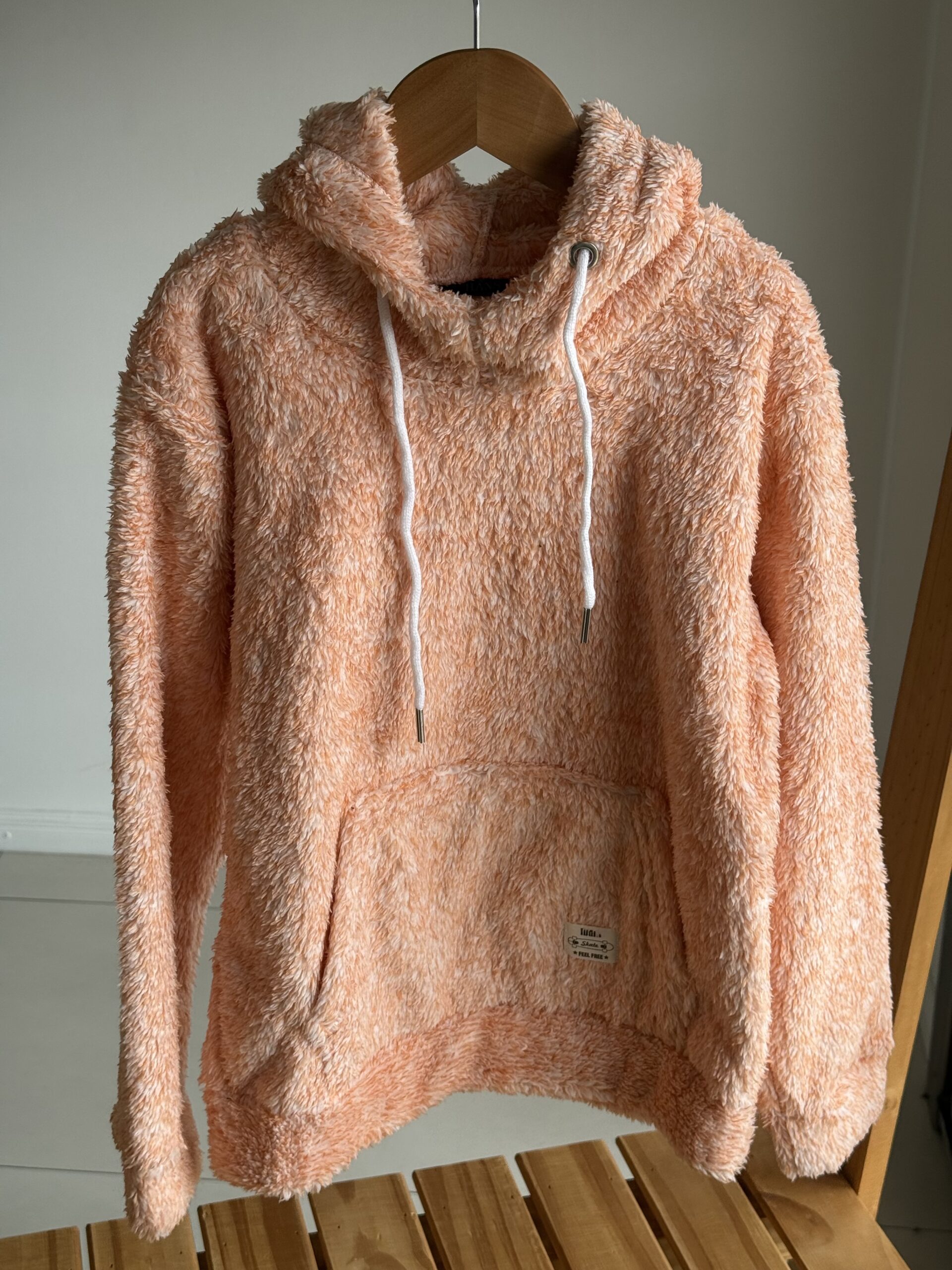 BUZO PELUCHE NARANJA SALMON Y BLANCO