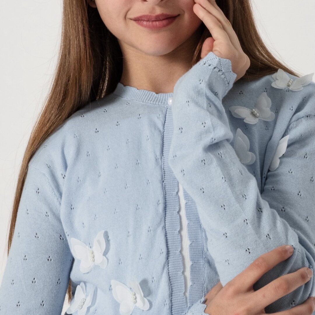 CARDIGAN MARIPOSA CELESTE. LINEA IMPORTADA