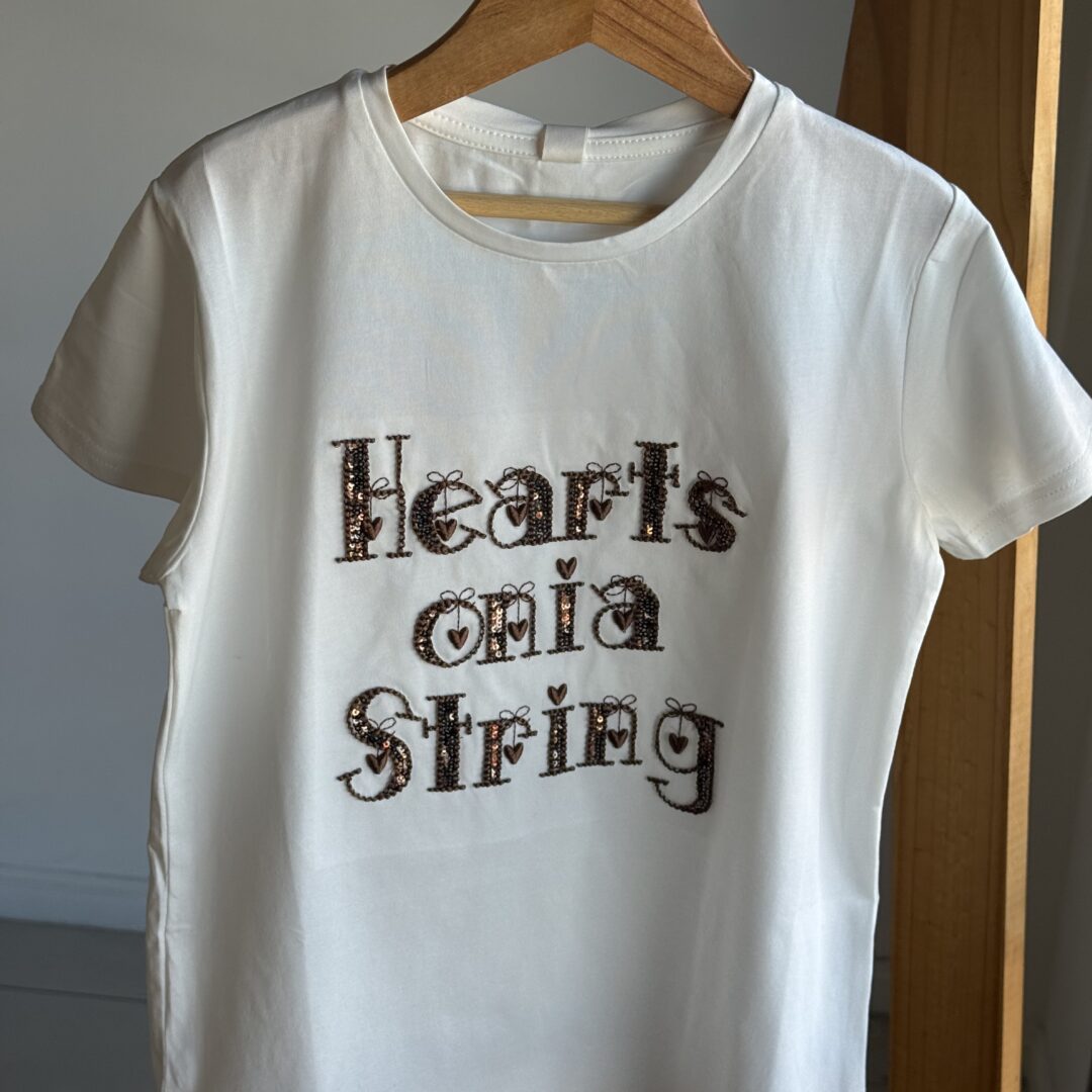 REMERA HEARTS BLANCA . LINEA IMPORTADA