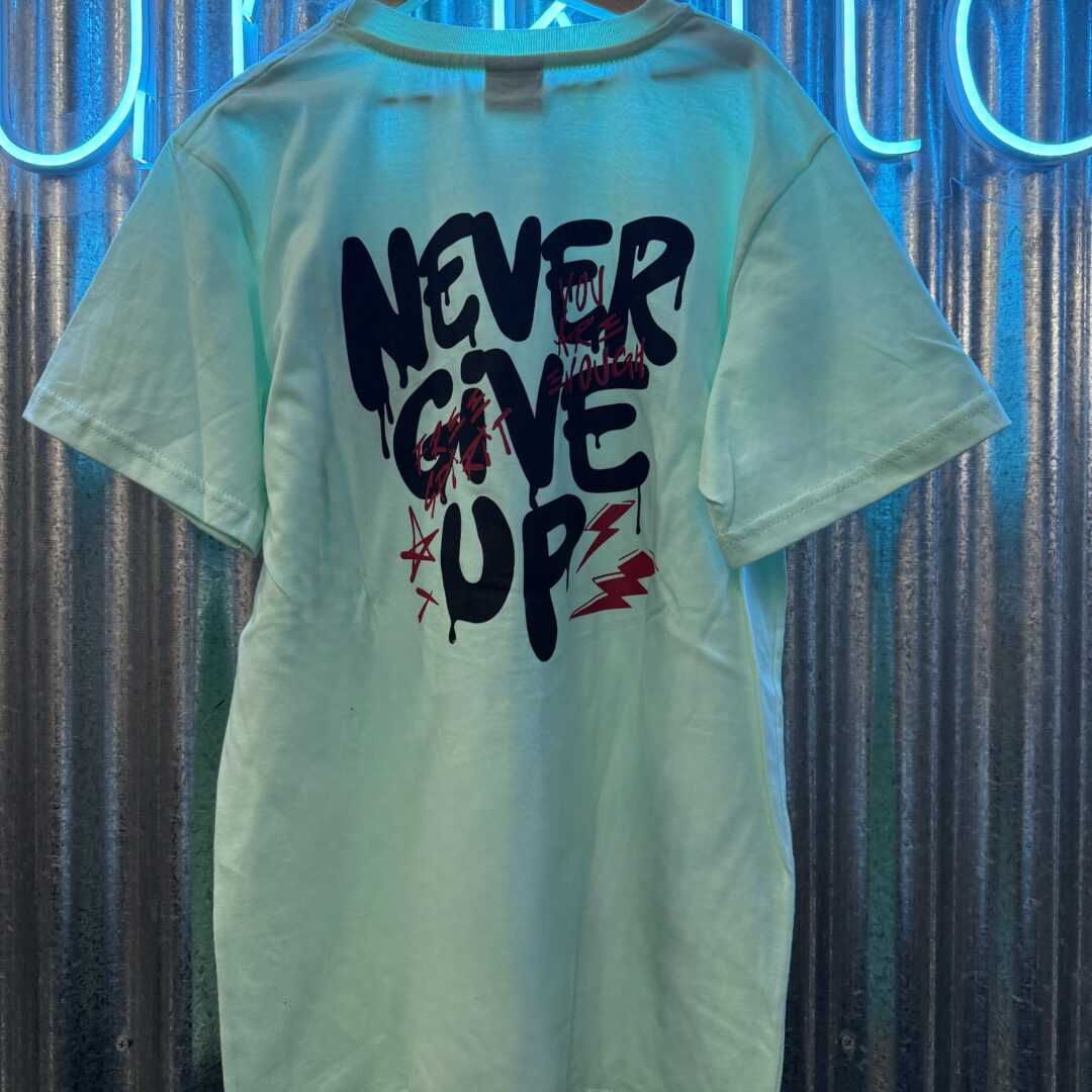 REMERA NEVER GIVE VERDE AGUA
