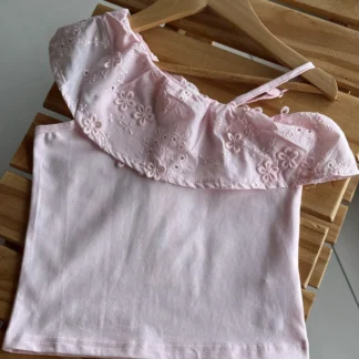 BLUSA ASIMÉTRICA ROSA. LÍNEA IMPORTADA