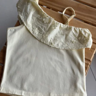 BLUSA ASIMÉTRICA AMARILLA .LINEA IMPORTADA